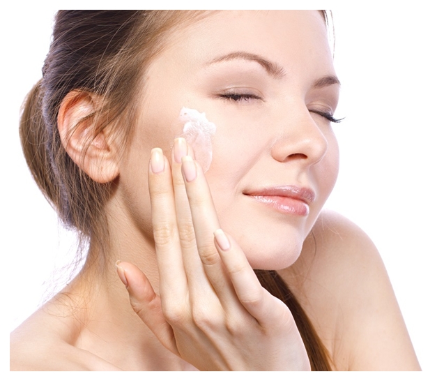 applying cream for face